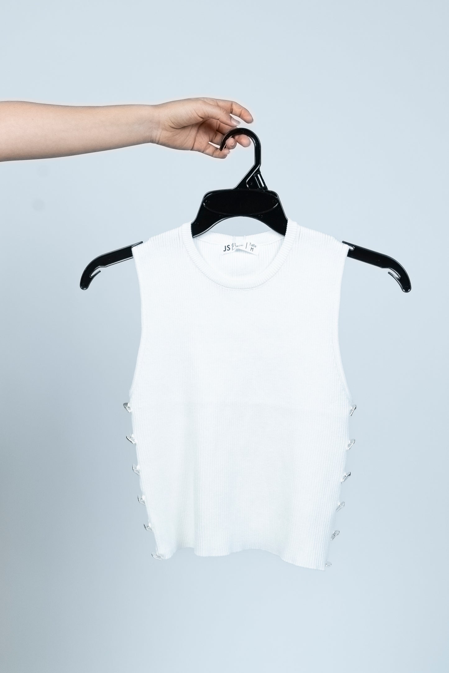 Blusa de tejido con aplicaciones laterales
