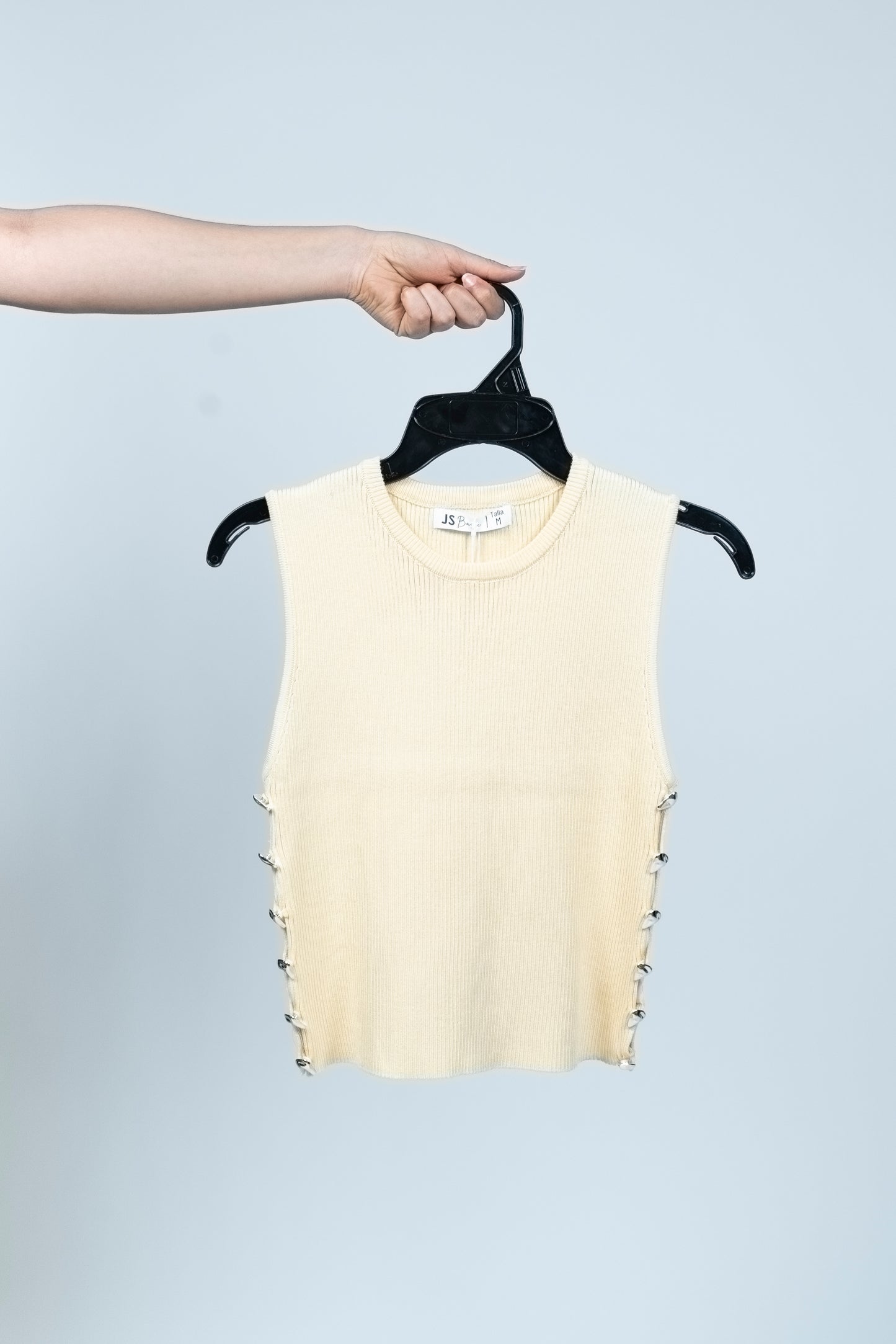 Blusa de tejido con aplicaciones laterales