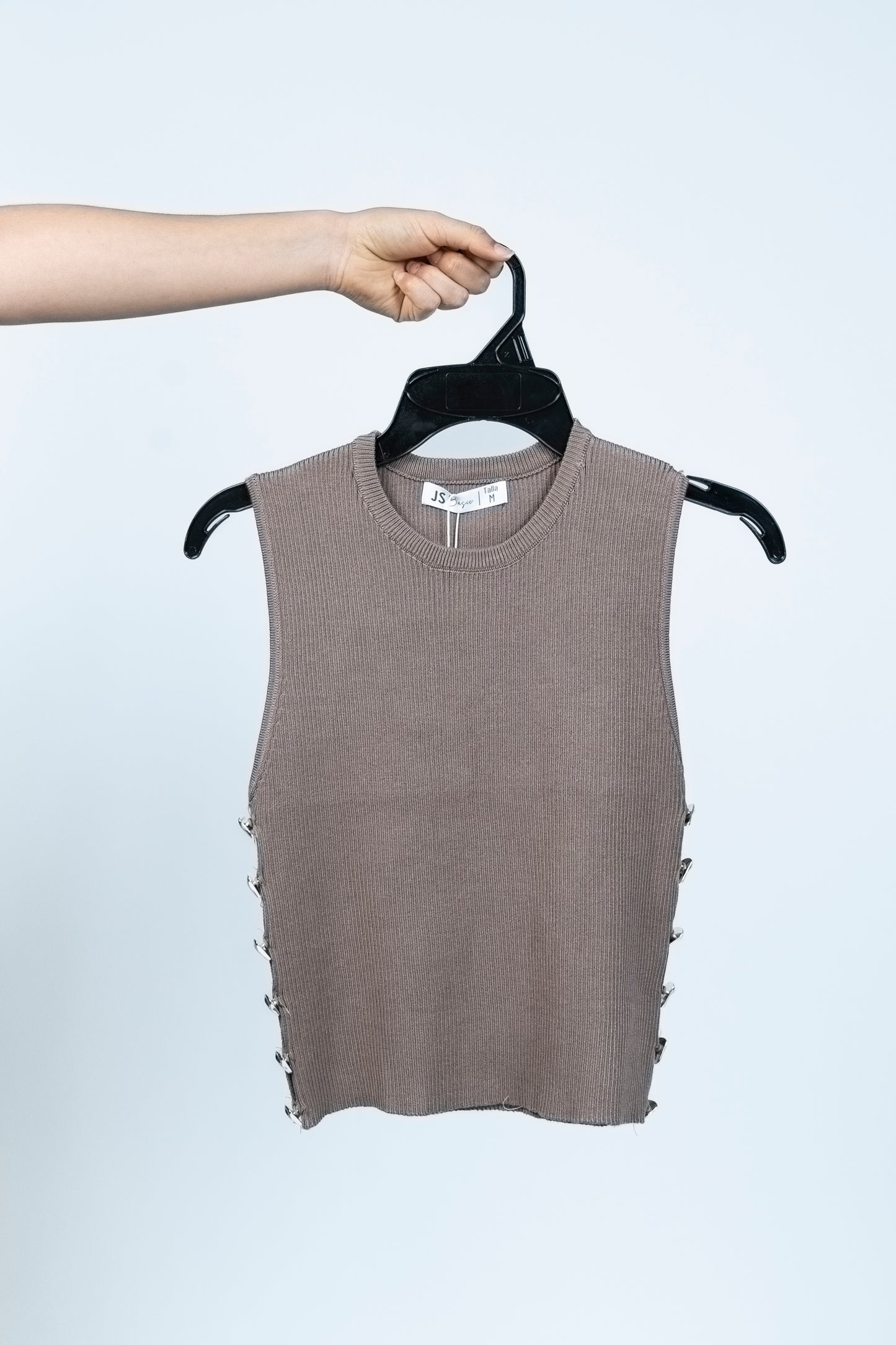 Blusa de tejido con aplicaciones laterales